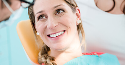 Smiling woman in dental chair