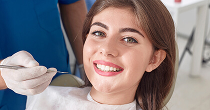 Smiling woman in dental chair