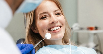 Woman smiling in dentist's chair