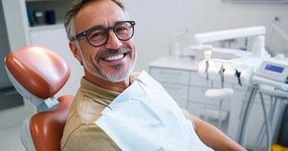 Smiling middle-aged dental patient