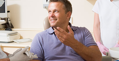 Man smiling in dental chair