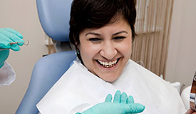 Smiling woman in dental chair