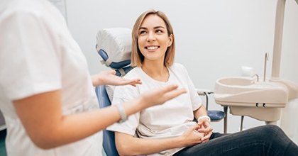 woman talking to her cosmetic dentist in Bristol about teeth whitening 